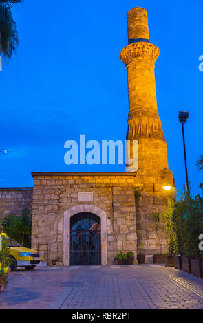 Preserved ruins of Kesik Minare Mosque (Broken Minaret) in soft evening lights, Antalya, Turkey. Stock Photo