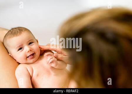 Studio Photo Of Cute Beautiful Baby Girl With Her Beautiful Mother Posing  On Christmas Background Stock Photo, Picture and Royalty Free Image. Image  59118884.