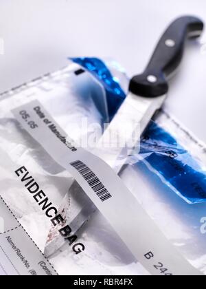 Forensic evidence collection. A knife about to be swabbed for DNA (deoxyribonucleic acid) and other forensic tests.
