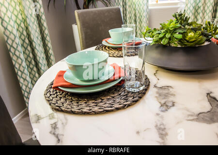 Place Setting On Round Marble Table Stock Photo