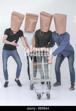 group of people with empty shopping carts. Stock Photo