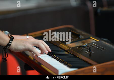 playing on piano Stock Photo