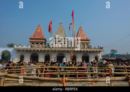 Thousands of pilgrims offer prayers to the sage Kapil at Gangasagar fair. Stock Photo