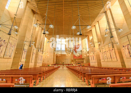 Los Angeles, California, United States - August 9, 2018: Interior and central nave of Cathedral of Our Lady of the Angels on Temple Street, LA of Downtown, also known as COLA o in postmodern style. Stock Photo