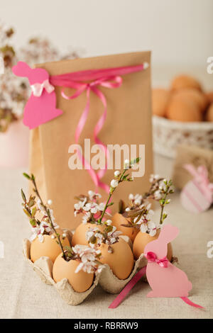 Happy easter. Easter decoration - flowering branches in the shell from the eggs. Selective focus. Stock Photo