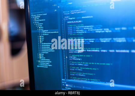Programming code on a monitor. Stock Photo