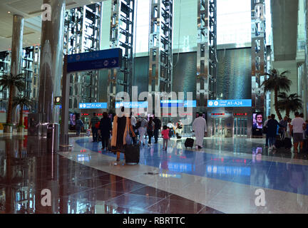 Dubai Airport, UAE - October 8th, 2017: Modern architecture with large lifts and water fountains inside of Dubai airport Stock Photo