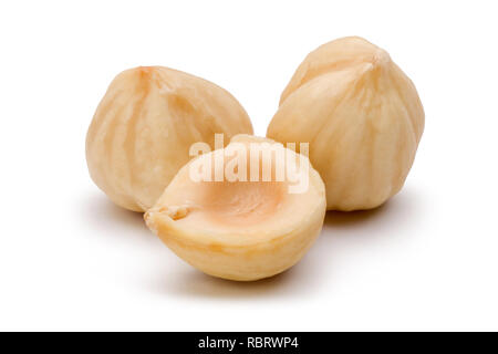 Peeled hazelnuts isolated on white background. Macro, studio shot. Stock Photo
