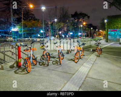 SANTIAGO, CHILE - SEPTEMBER 14, 2018: Outdoor view of public bikes for rent located an the enter of central railway station in Santiago, Chile Stock Photo