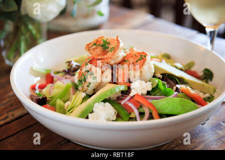 California - Greek Style Salad topped with Prawns Stock Photo