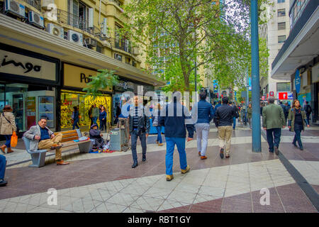 SANTIAGO, CHILE - OCTOBER 16, 2018: Outdoor view of crowd of people walking in the sidewalk in Santiago, Chile Stock Photo