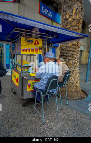 SANTIAGO, CHILE - OCTOBER 16, 2018: Outdoor view of food market located in the sidewalk of the center of Santiago of Chile Stock Photo