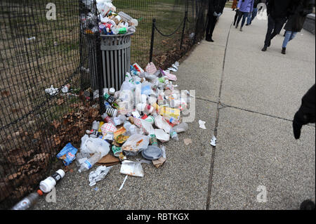 Trash lies uncollected on the National Mall in Washington DC on the 12th day of the partial government shutdown Jan. 2, 2019. Stock Photo