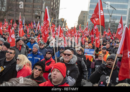 Windsor, Ontario, Canada - 11 January 2019 - Canadian auto workers, members of the Unifor labor union, rallied across the Detroit River from the General Motors headquarters in Detroit to protest GM's plan to close the Oshawa, Ontario assembly plant, throwing thousands out of work. Credit: Jim West/Alamy Live News Stock Photo