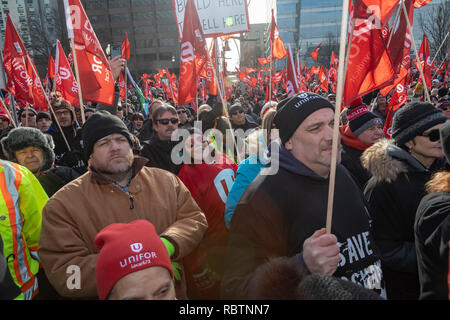 Windsor, Ontario, Canada - 11 January 2019 - Canadian auto workers, members of the Unifor labor union, rallied across the Detroit River from the General Motors headquarters in Detroit to protest GM's plan to close the Oshawa, Ontario assembly plant, throwing thousands out of work. Credit: Jim West/Alamy Live News Stock Photo