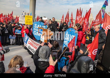 Windsor, Ontario, Canada - 11 January 2019 - Canadian auto workers, members of the Unifor labor union, rallied across the Detroit River from the General Motors headquarters in Detroit to protest GM's plan to close the Oshawa, Ontario assembly plant, throwing thousands out of work. Credit: Jim West/Alamy Live News Stock Photo