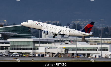 Richmond, British Columbia, Canada. 11th Jan, 2019. A Delta Connection (Compass Airlines) Embraer 175 (N628CZ) jet airliner takes off from Vancouver International Airport. The airliner is owned and operated by Compass Airlines and flies under contract to Delta Air Lines. Credit: Bayne Stanley/ZUMA Wire/Alamy Live News Stock Photo