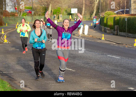 Stirling, Scotland, UK. 12th January, 2019. Runners have been taking part in this year's Great Stirling Castle Run, a challenging 7-kilometre course across the historic and picturesque Scottish city of Stirling. They were watched and cheered on by spectators as they crossed the finish line in King's Park. The event was sponsored by Simplyhealth. Iain McGuinness / Alamy Live News Stock Photo