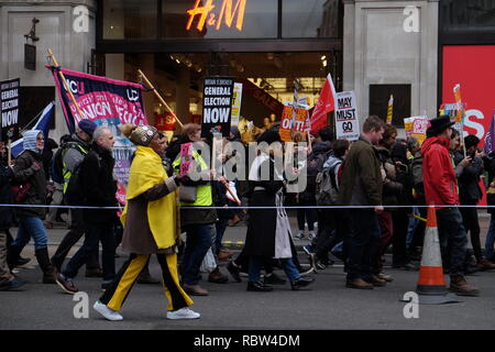 London, UK. 12th January, 2019. Protesters from both sides of the political spectrum in London adopt the wearing of yellow vests Credit: Londonphotos/Alamy Live News Stock Photo
