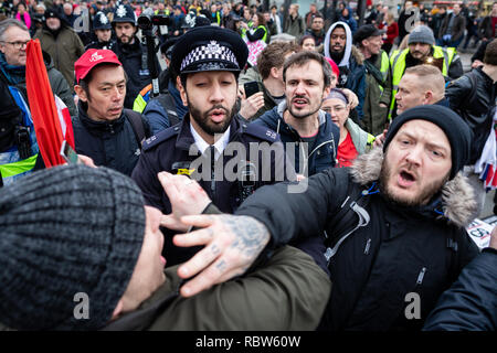 London, UK. 12th Jan, 2019. Hundreds of protesters gathered in the city to march under the slogan Britain Is Broken, which saw the Yellow Vests movement come to the United Kingdom. The yellow vest movement has been adopted by both left and right parties who later clashed in Trafalgar Square. Credit: Andy Barton/Alamy Live News Stock Photo