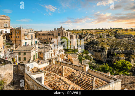 The Convent of Saint Agostino overlooks the canyon and the ancient sassi caves in the city of Matera, Italy. Stock Photo