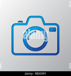 Bright blue photo camera out of paper. Vector illustration. Photo Camera is cut from paper. Camera icon with shadow. Stock Vector