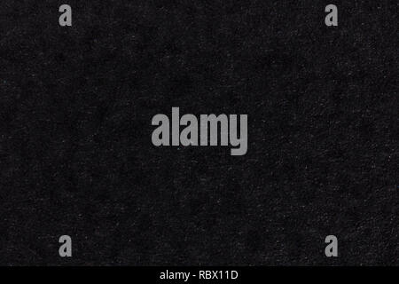 Black paper texture background. colored cardboard fibers and grain. empty space concept. Stock Photo