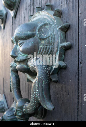 Close-up of vintage door knocker on a church door, in Merida, Mexico. Stock Photo