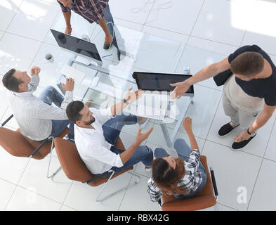 Top view creative team works in the office Stock Photo - Alamy