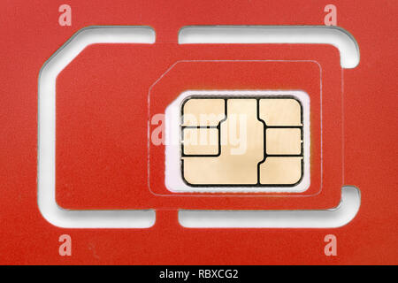 New blank red phone sim card close up. Macro image Stock Photo