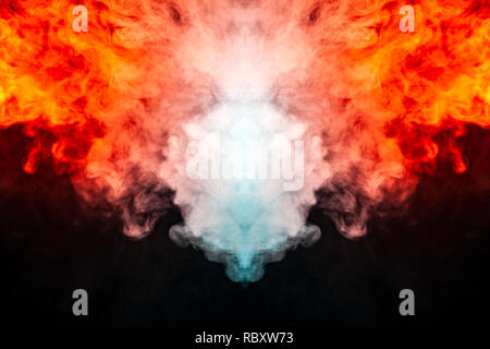 Waving, translucent smoke, illuminated by light against a dark background, divided into two colors: blue and red, burned, twisting in a dramatic silho Stock Photo