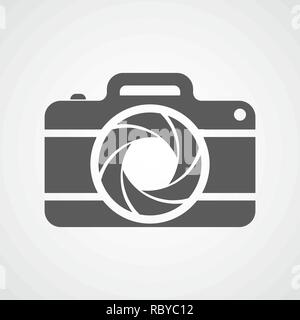 Gray photo camera icon in flat design. Vector illustration. Camera icon isolated on white background. Stock Vector