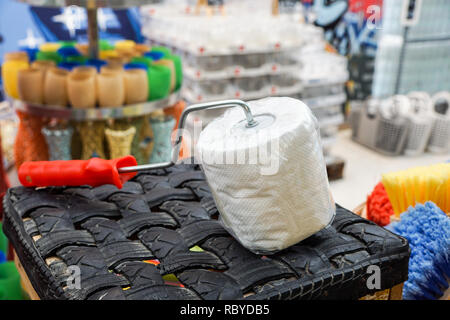 Close-up image of toilet paper on an original toilet paper holder Stock Photo