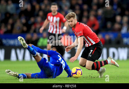Leicester City's Hamza Choudhury (left) and Southampton's Stuart Armstrong battle for the ball during the Premier League match at the King Power Stadium, Leicester. Stock Photo