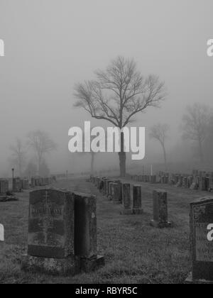 Mary Rest Cemetery, Mahwah New Jersey in a somber foggy scene. Stock Photo