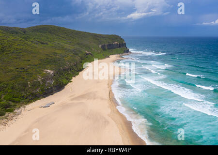 An aerial view of Dudley Beach - just south of Newcastle, storm clouds in the background. Thsi beach is surrounded by state park and a beautiful secti Stock Photo