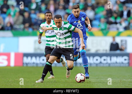 Jefferson of Sporting (L) and Héctor Herrera of FC Porto (R) are seen during the League NOS 2018/19 football match between Sporting CP vs FC Porto. (Final score: Sporting CP 0 - 0 FC Porto) Stock Photo