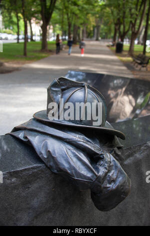 The Vendome Memorial, honoring 9 firefighters killed in the 1972 Hotel Vendome Fire, sculpted by Theodore Clausen, Commonwealth Avenue, Boston, MA Stock Photo