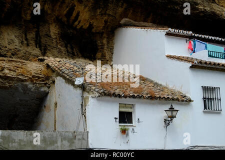 Houses built into the cliff face and caves. Setenil de las Bodegas, Andalusia. Spain Stock Photo