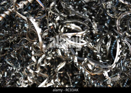 Discarded tangled twisted pieces raw industrial scrap metal waste ...