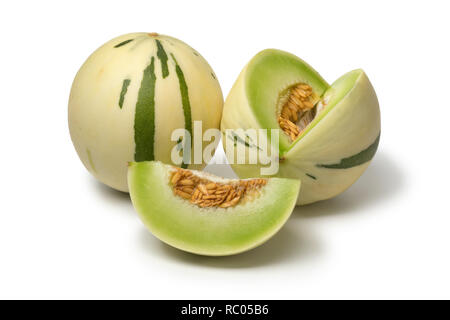 Pair of white honeydew melons and a wedge isolated on white background Stock Photo