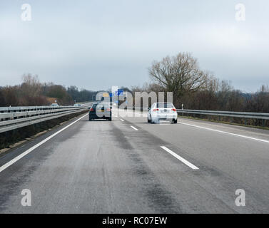 FRANKFURT, GERMANY - FEB 18, 2018: Driver POV personal perspective toward the driving Audi cars on the autobahn highway  Stock Photo