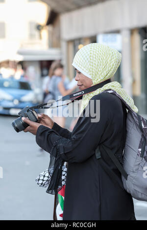 Lady checking her last photograph on digital camera screen, Pisa, Tuscany, Italy, Europe, Stock Photo