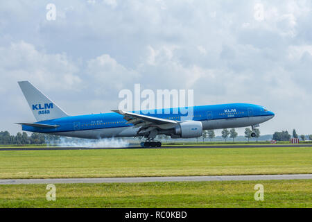 Schiphol Airport, the Netherlands - August 20, 2016: KLM boeing 777 landing Stock Photo