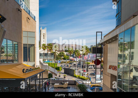 Hollywood Boulevard, Hollywood Hills, traffic and pedestrians on Hollywood Boulevard, Colorful Billboards. View from Dolby Theatre, November 27, 2018 Stock Photo