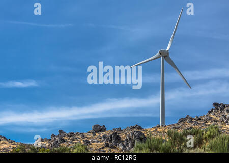 View of a wind turbines on top of mountains, in Portugal... Stock Photo