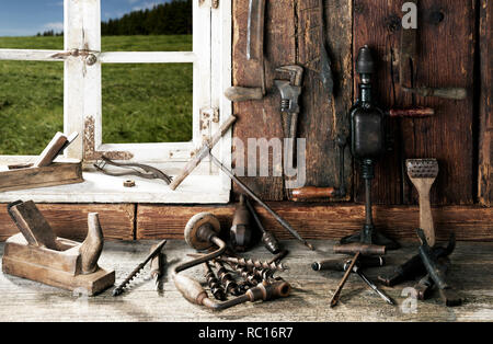 Vintage stylized old wood workshop interior Stock Photo