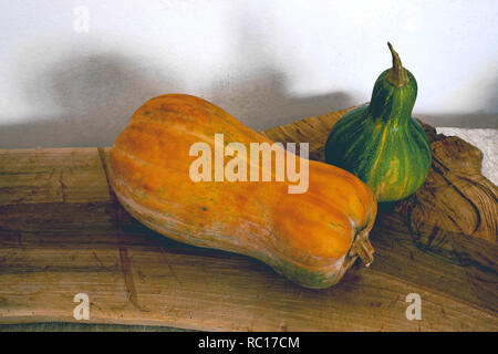 Green and yellow pumpkin from the home garden on a wooden board. Food, home. Still life. Stock Photo