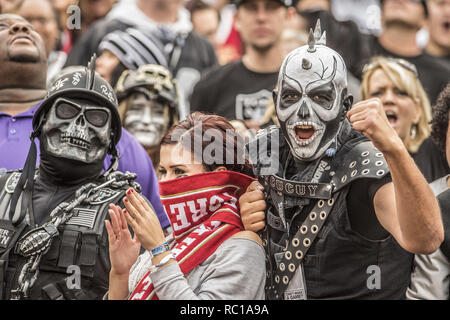 Oakland, California, USA. 7th Dec, 2014. Raider fans has a girl friend that is a 49er fan on Sunday, December 7, 2014, at O.co coliseum in Oakland, California. The Raiders defeated the 49ers 24-13. Credit: Al Golub/ZUMA Wire/Alamy Live News Stock Photo