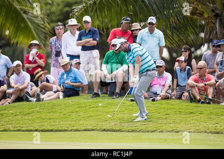 Honolulu, Hawaii, USA. 12th Jan, 2019. Marc Leishman chips on to the 3rd hole green during the third round of the Sony Open at Waialae Country Club in Honolulu, Hawaii. Glenn Yoza/CSM/Alamy Live News Stock Photo